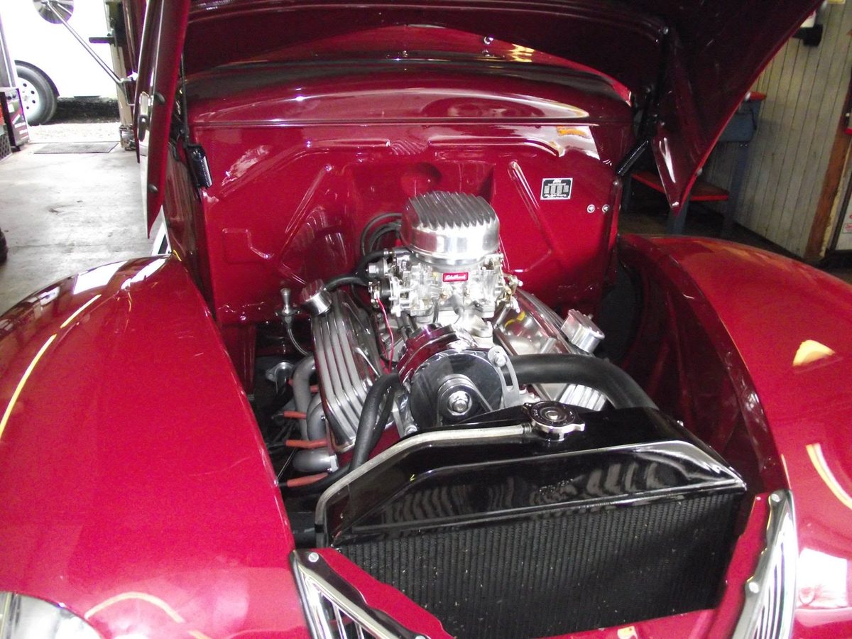 Rebuilt chrome V8 engine in a classic car at M.D. Automotive, Sutherlin OR