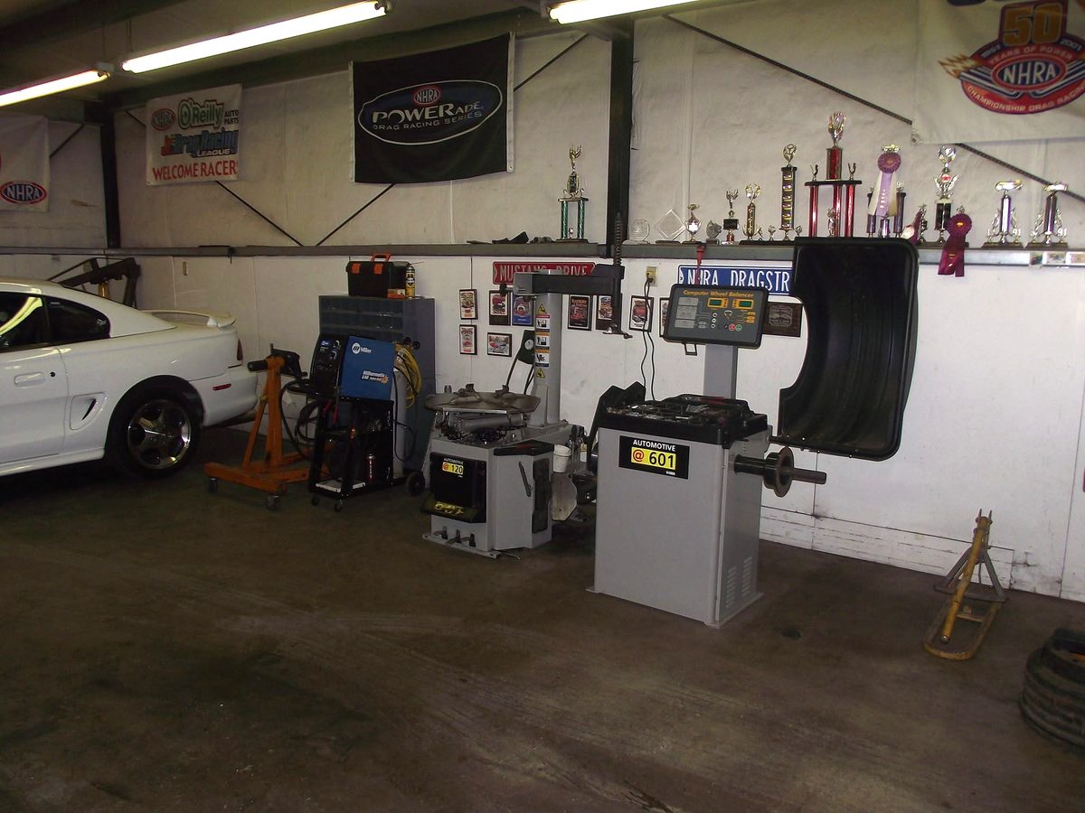 Tire mounting and balancing machines on the floor at M.D. Automotive, Sutherlin OR